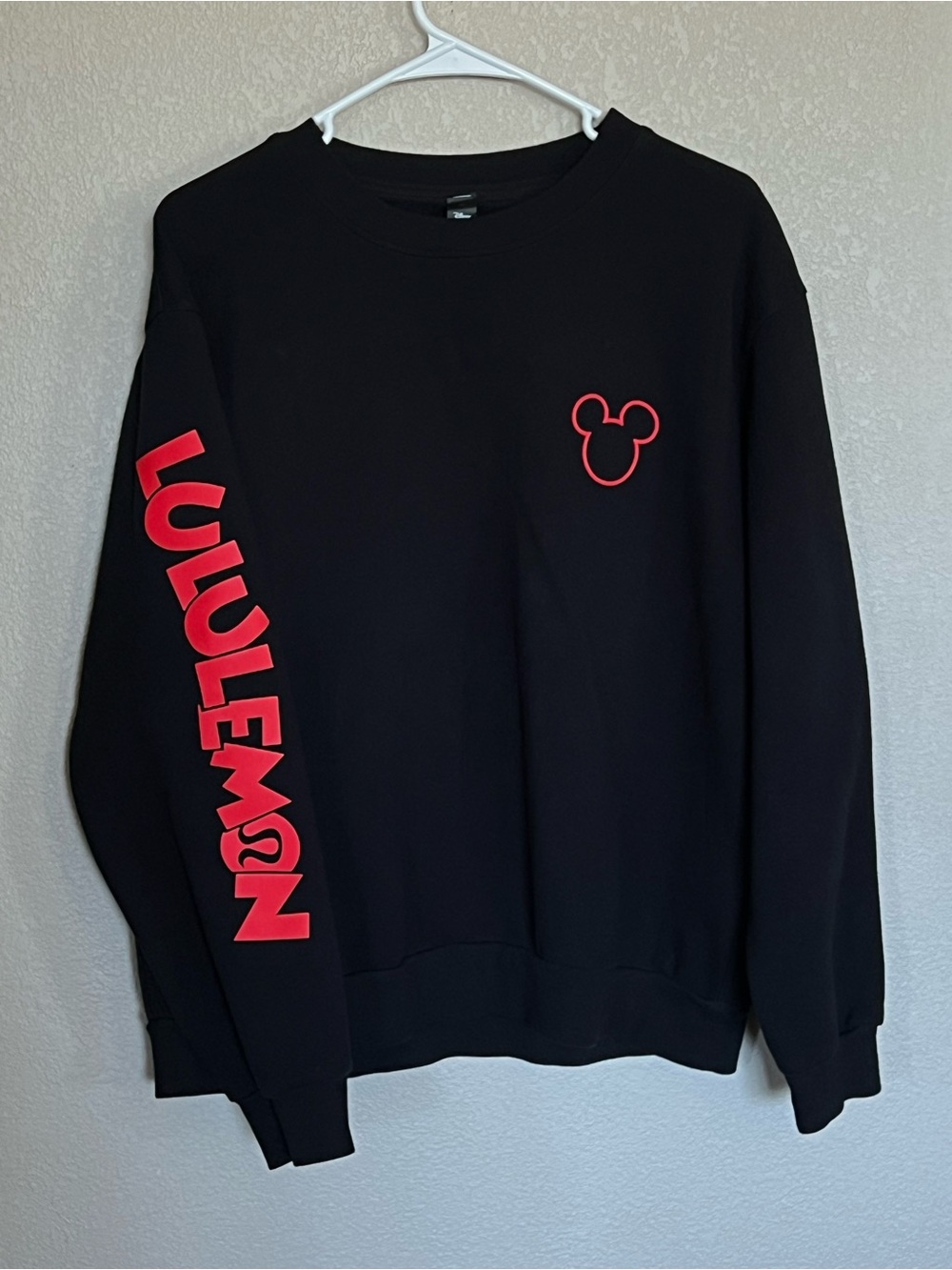 Lululemon x Disney collaboration men’s black crewneck